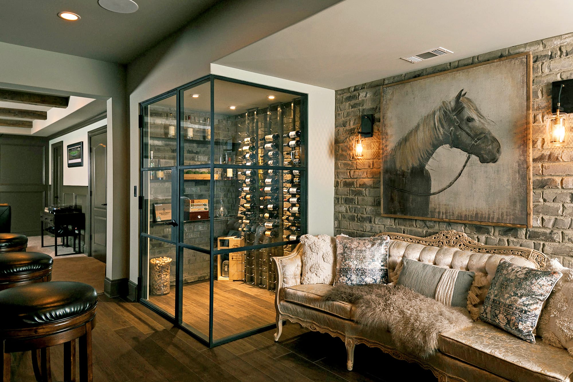 Wine room and living room in custom luxury home